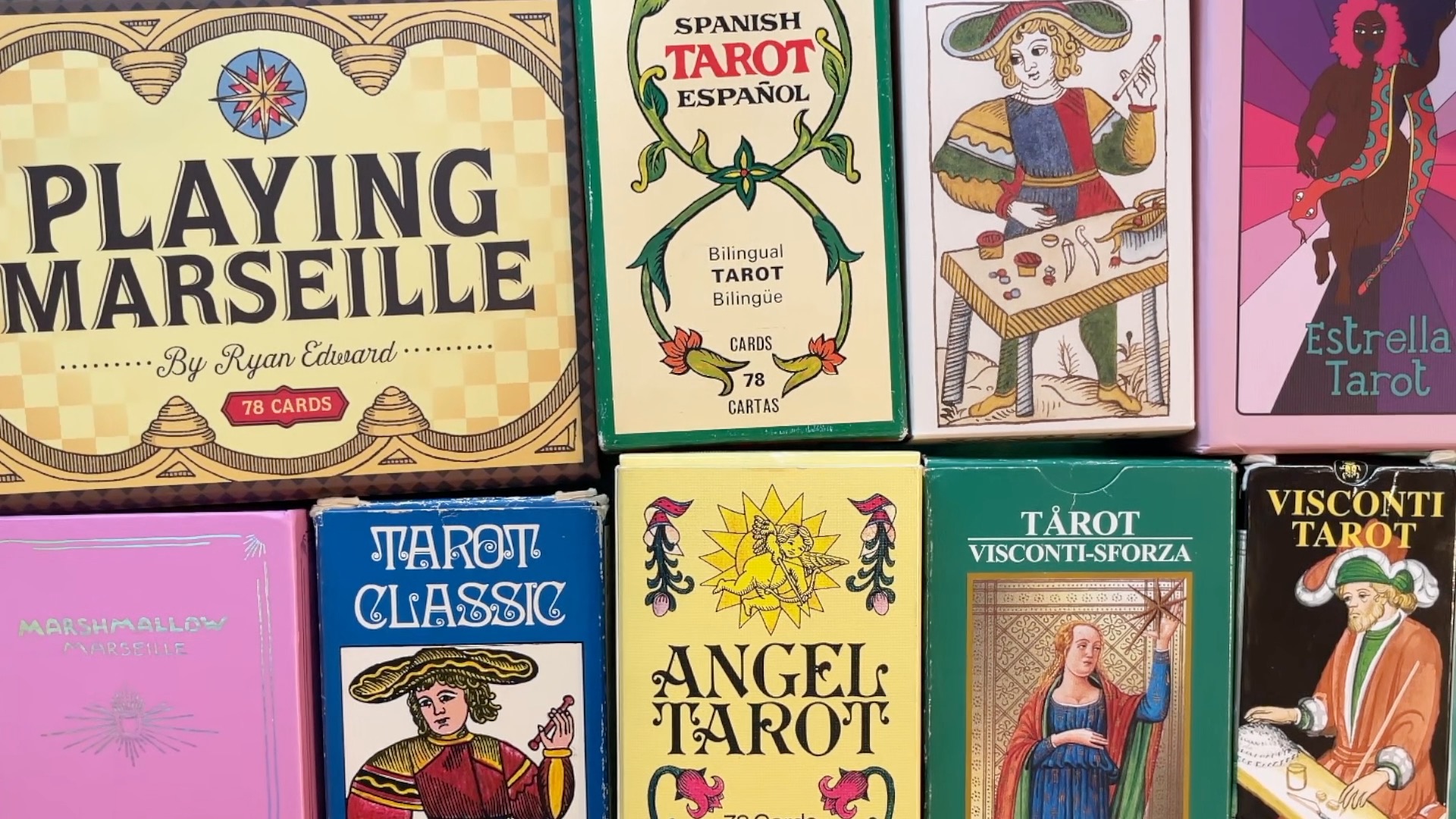 A group of boxes for modern brightly colored tarots.